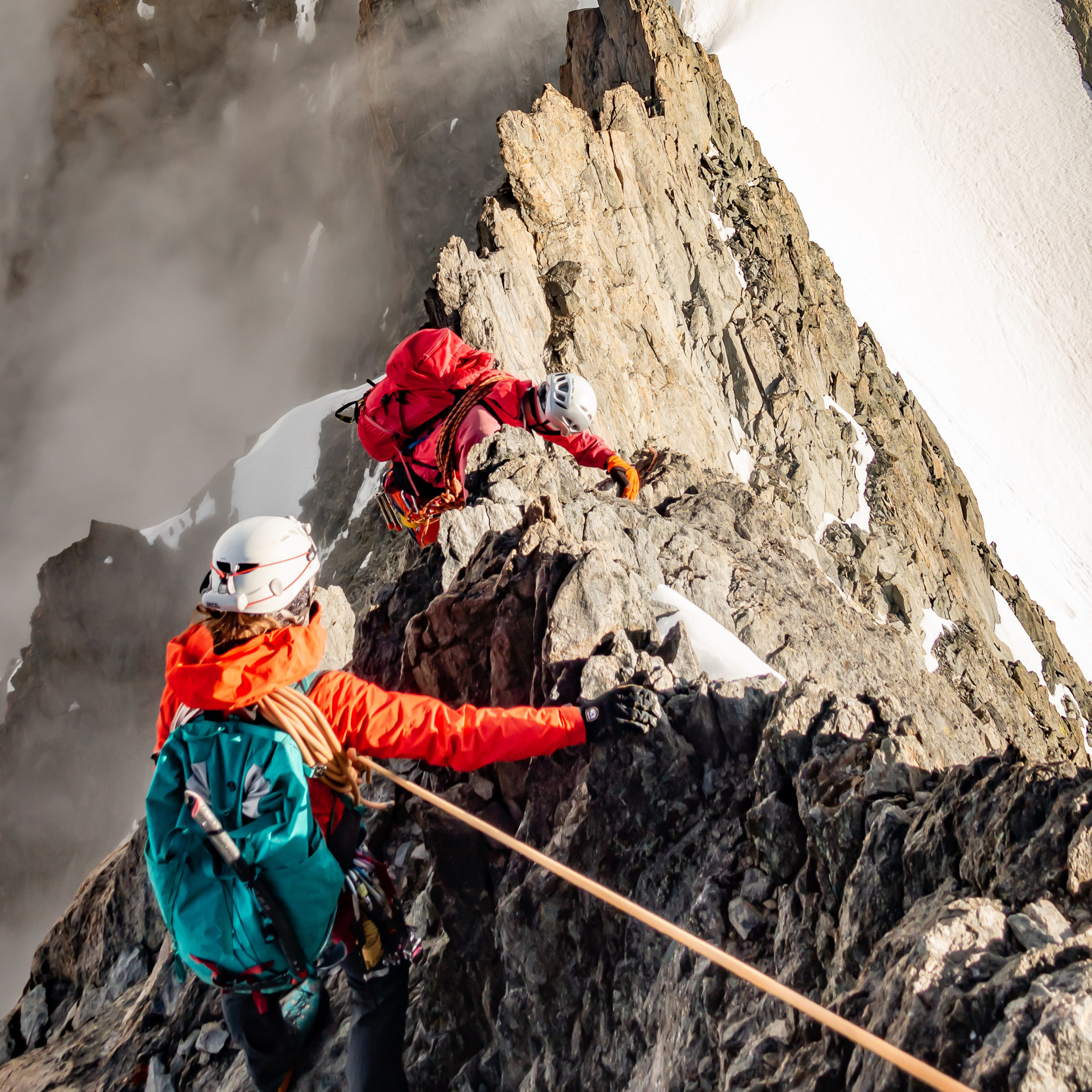 Alpinists on a mountain ridge